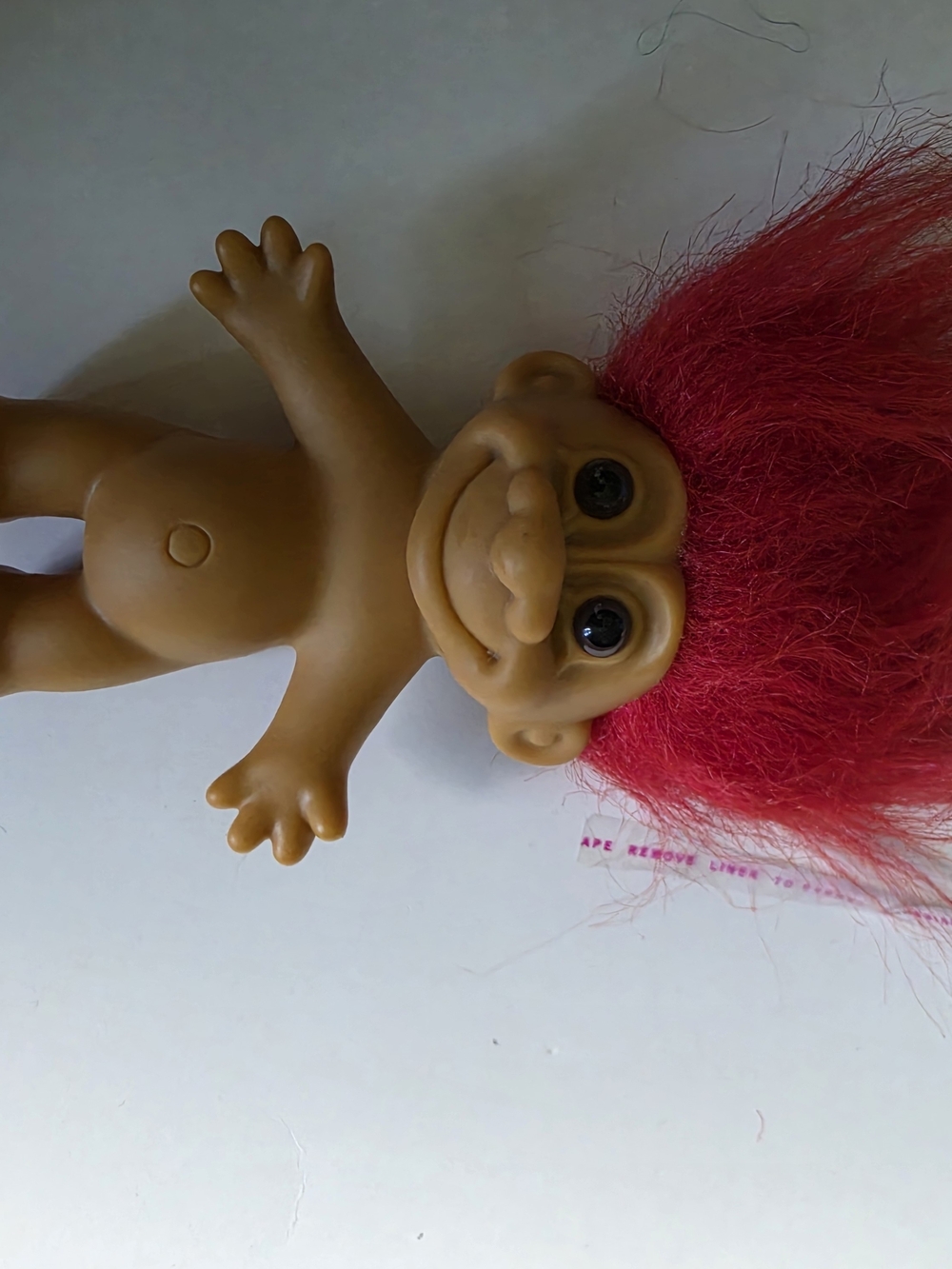 vintage Russ Troll Doll with vibrant red hair